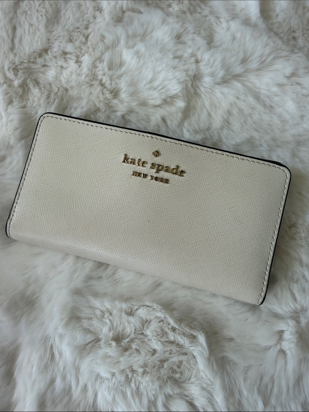kate spade cream Bifold saffiano wallet with gold logo